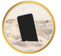Mobile Phone resting in the sand on the beach